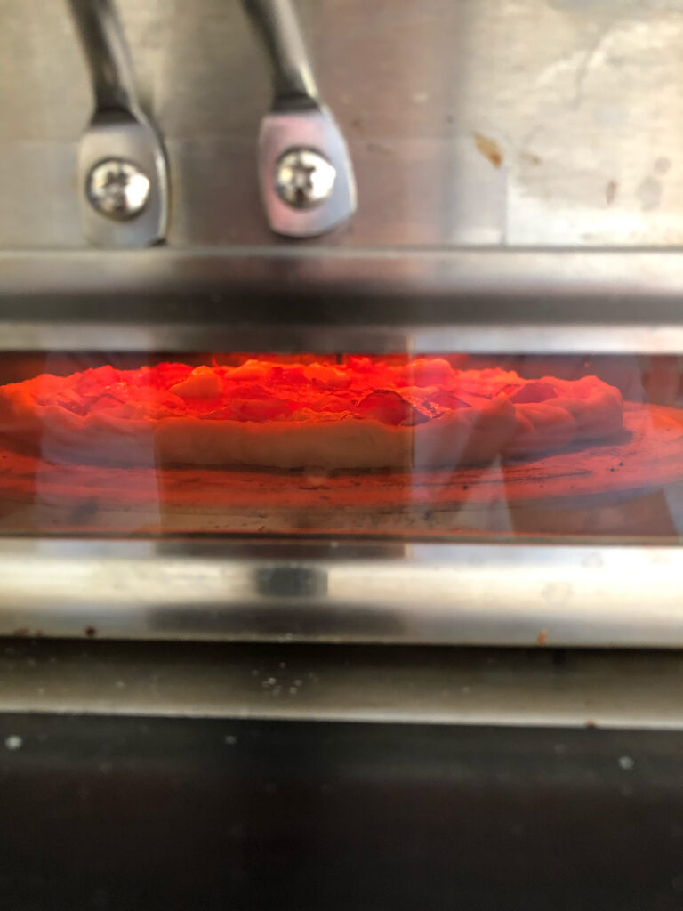 Dekorativbild Pizza i ugnen